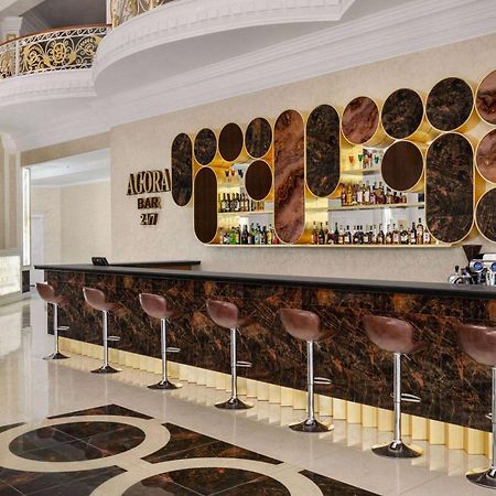 Hotel Ramada By Wyndham Shymkent Esterno foto