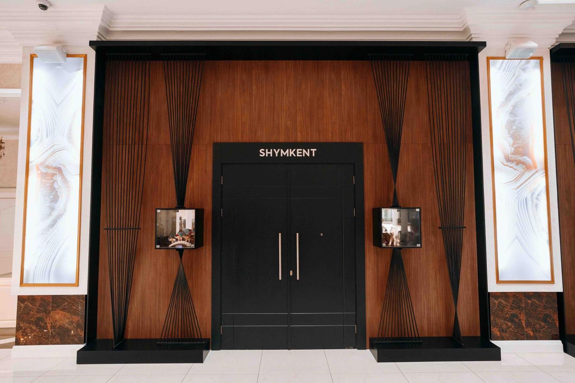 Hotel Ramada By Wyndham Shymkent Esterno foto