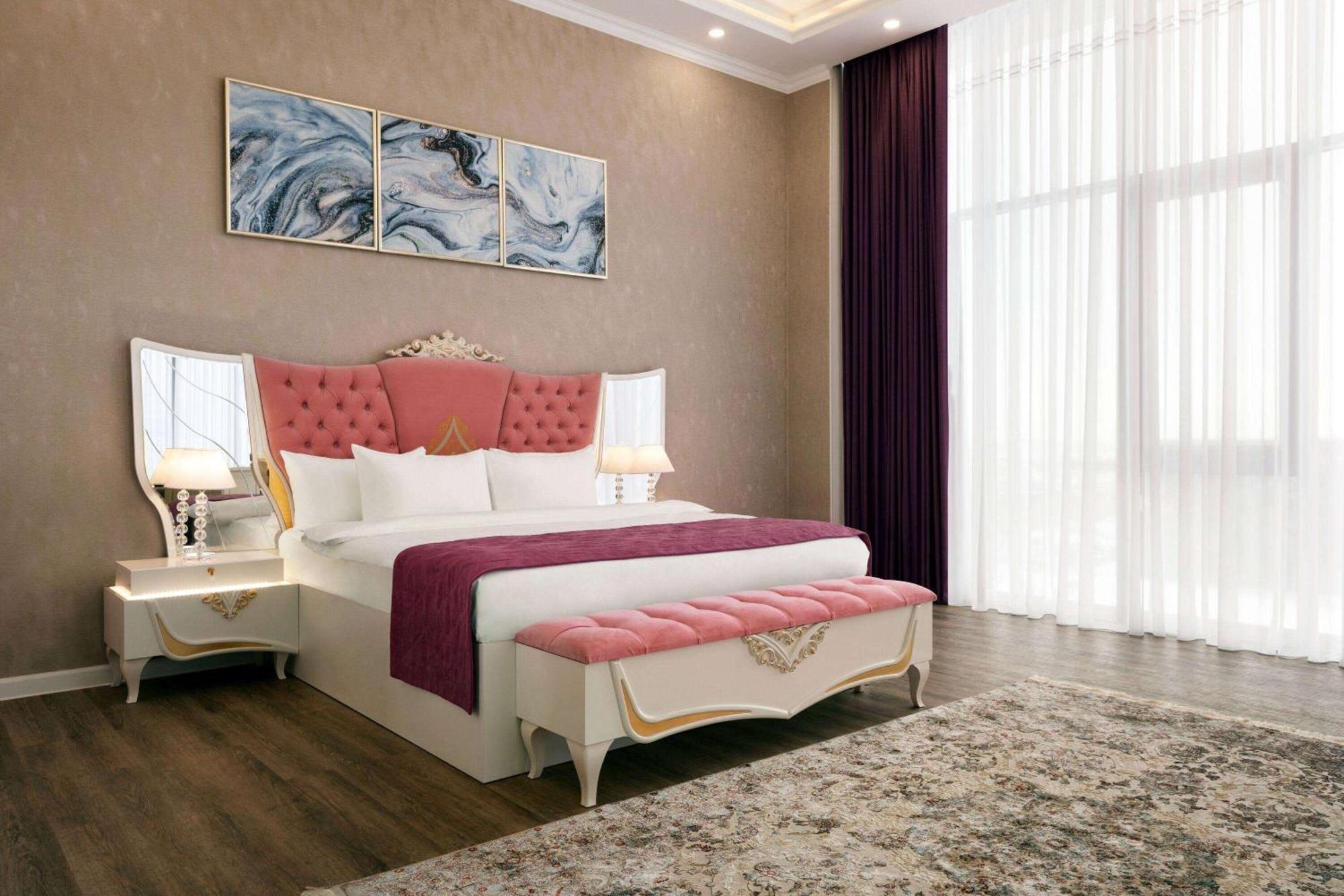 Hotel Ramada By Wyndham Shymkent Esterno foto